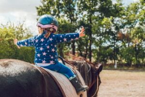 Child at a Horseback Riding Camp at Ridge Meadow Horse Farm in York, PA